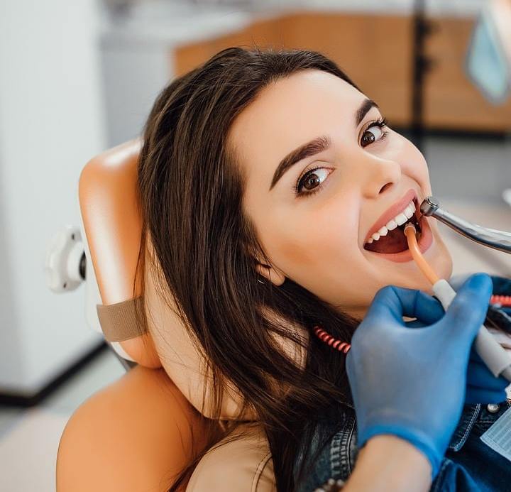 Smiling dental patient in chair